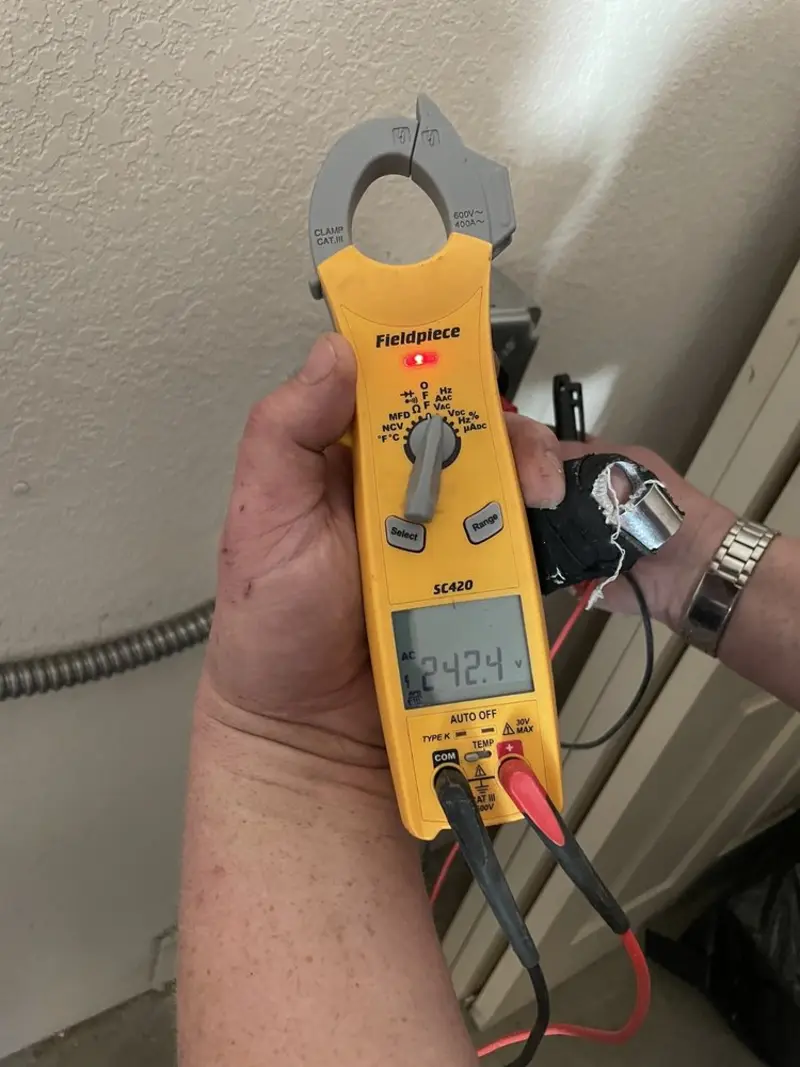Voltage testing with clamp meter during Hot Tub / Pool Electrical Wiring in Hinesville